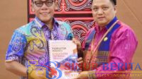 Bupati Masinton Pasaribu dan Ketua BPS Akhirul Miswar Nasution.